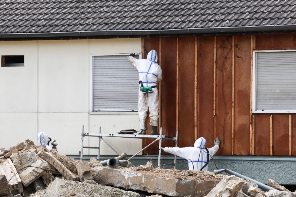 Professionals in protective suits